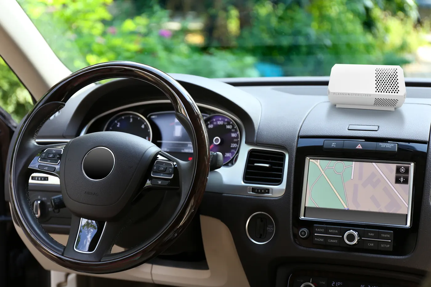AIRE Plasma Air purifier on a car dashboard